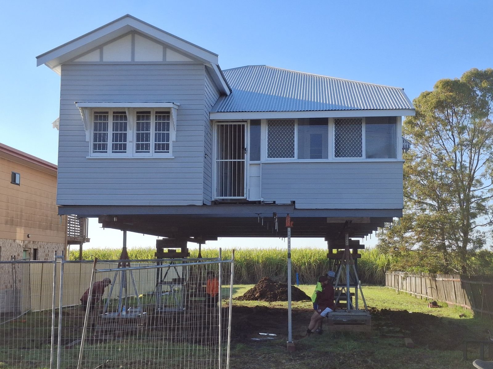House raised high on steel supports