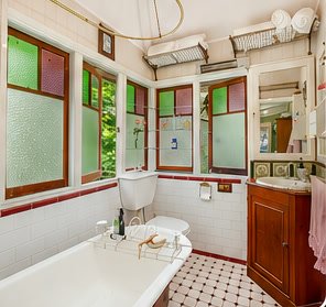 Wisteria bathroom with leadlight windows